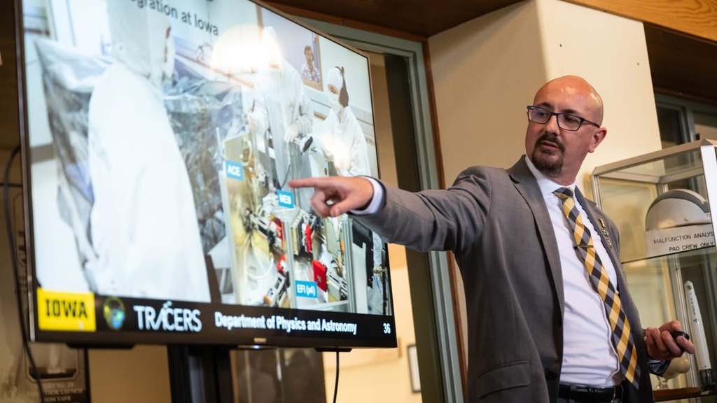 Dr. David Miles gives a public presentation at a community briefing about the TRACERS mission at the Vandenberg Space Force Base Space and Missile Technology Center near Lompoc, California.
